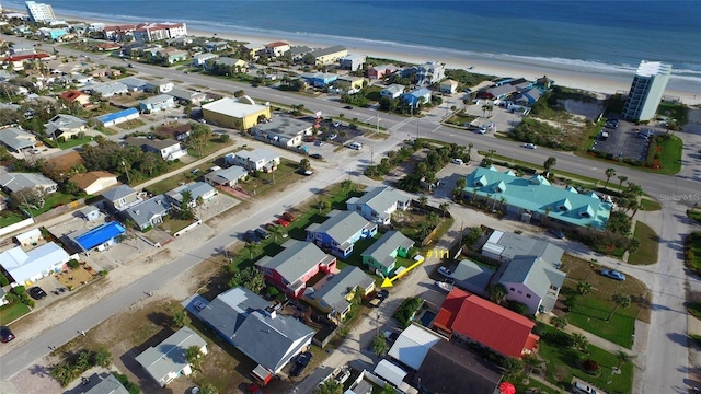 aerial view featuring a residential view and a water view