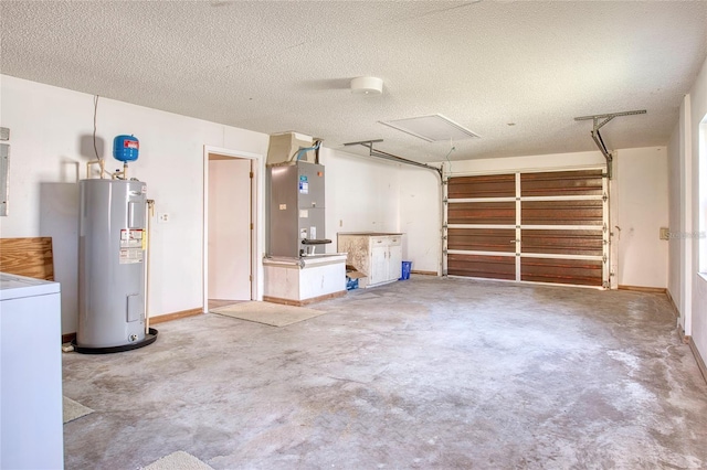 garage with washer / dryer, baseboards, water heater, and heating unit