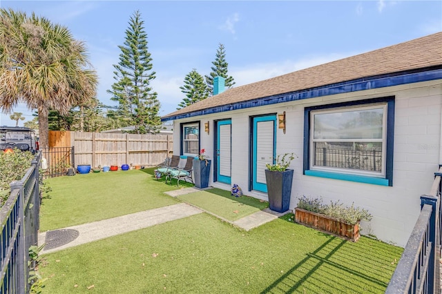 view of yard featuring a fenced backyard