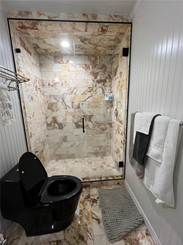 full bath featuring marble finish floor and a shower stall