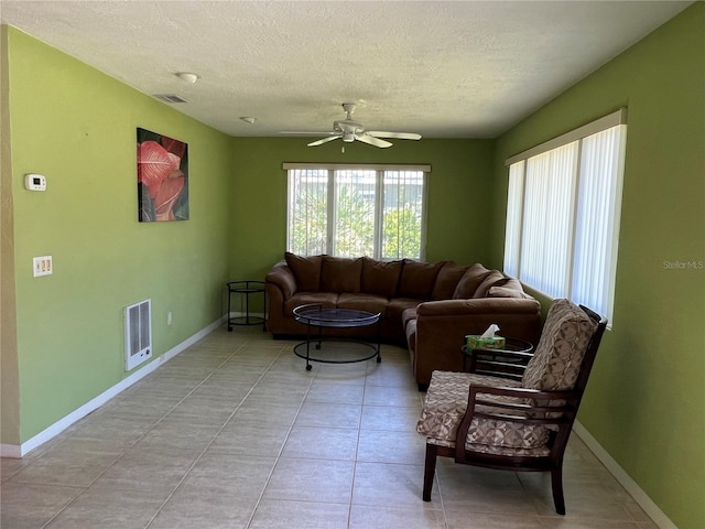 630 Yupon Ave, New Smyrna Beach, FL 32169 - living area featuring a healthy amount of sunlight, visible vents, and baseboards