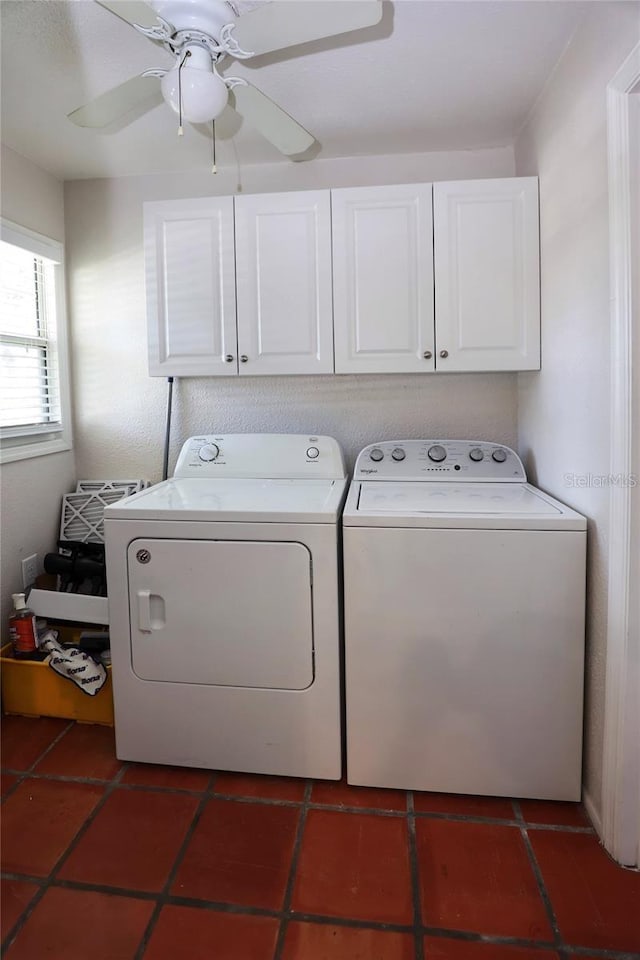 laundry area with tile patterned flooring, separate washer and dryer, cabinet space, and ceiling fan