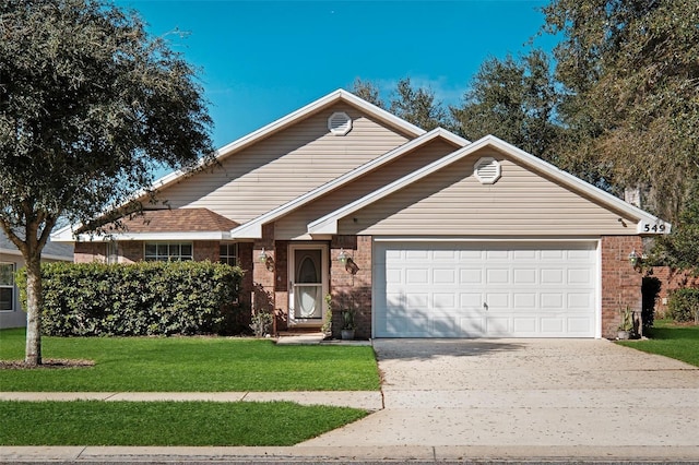 view of front of home featuring a garage, brick siding, driveway, and a front lawn