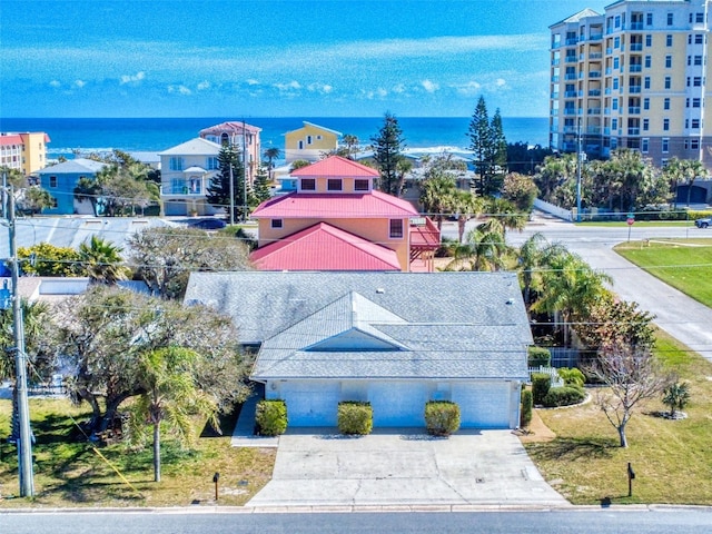 drone / aerial view featuring a water view