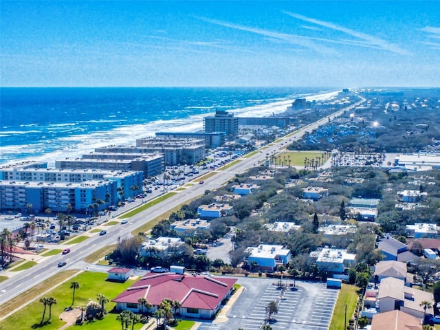 aerial view featuring a water view and a view of city