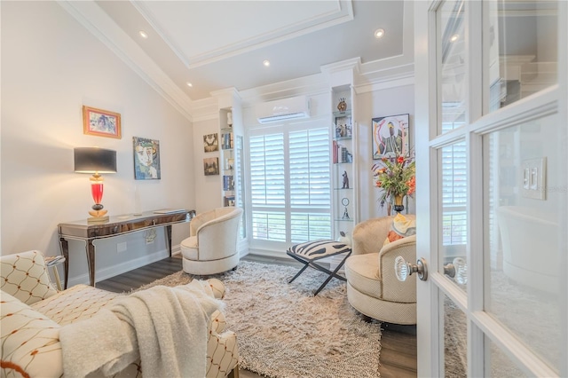 interior space featuring ornamental molding, recessed lighting, a wall unit AC, and wood finished floors