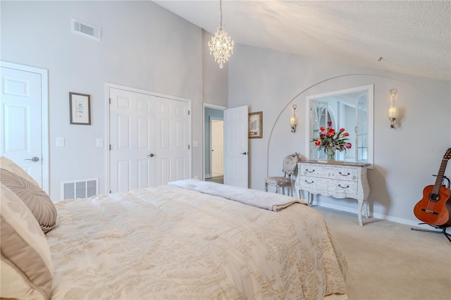 bedroom with an inviting chandelier, baseboards, visible vents, and carpet flooring