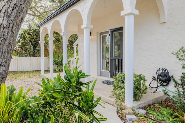 view of patio / terrace featuring fence