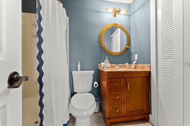 bathroom with shower / bath combo, vanity, and toilet