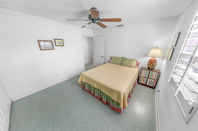 bedroom featuring visible vents, baseboards, and a ceiling fan