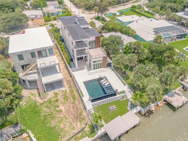 aerial view featuring a water view and a residential view