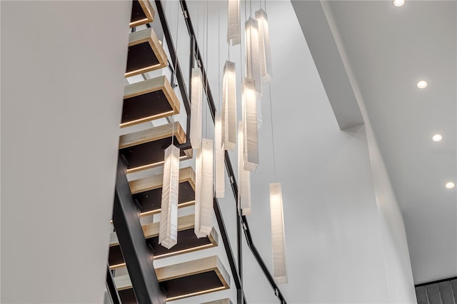 staircase with recessed lighting