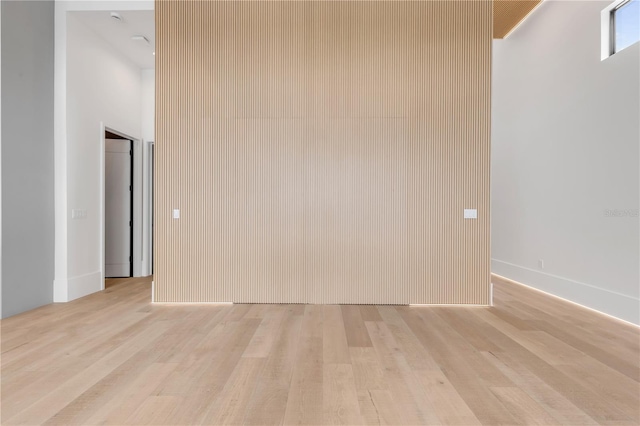 unfurnished room featuring light wood-style flooring