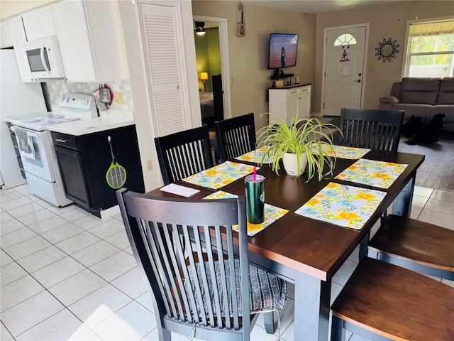 dining room with light tile patterned floors