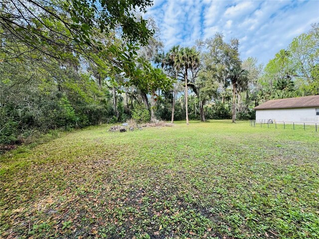 view of yard featuring fence