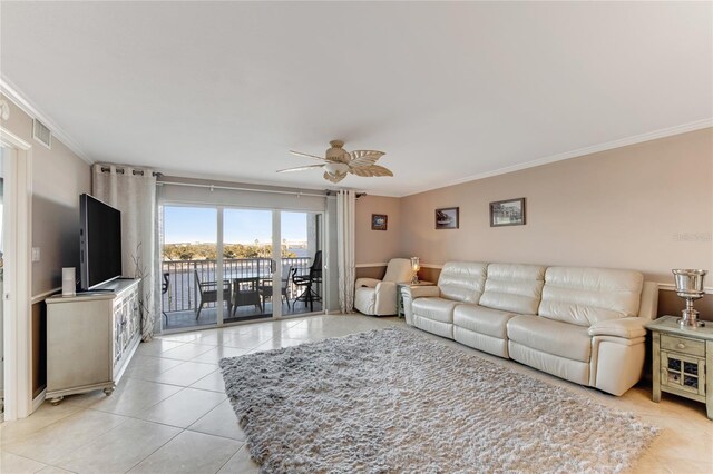 533 Marina Point Dr Unit 533, Daytona Beach, FL 32114 - living area featuring light tile patterned flooring, ceiling fan, ornamental molding, and visible vents