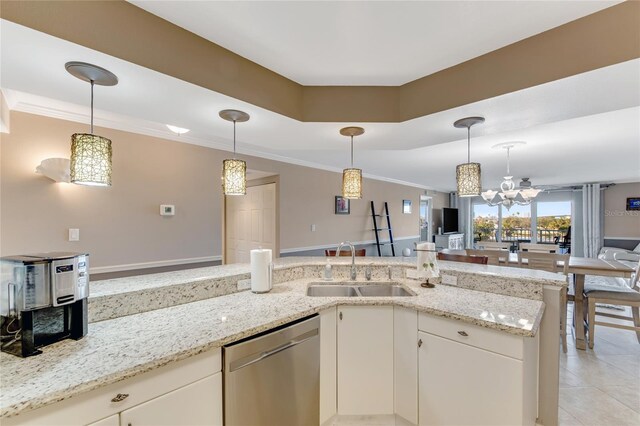533 Marina Point Dr Unit 533, Daytona Beach, FL 32114 - kitchen with stainless steel dishwasher, open floor plan, a sink, and decorative light fixtures