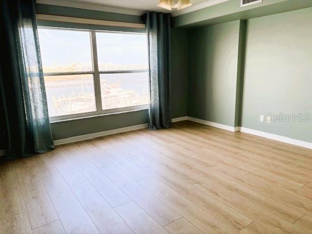 533 Marina Point Dr Unit 533, Daytona Beach, FL 32114 - unfurnished room featuring wood finished floors, baseboards, and visible vents