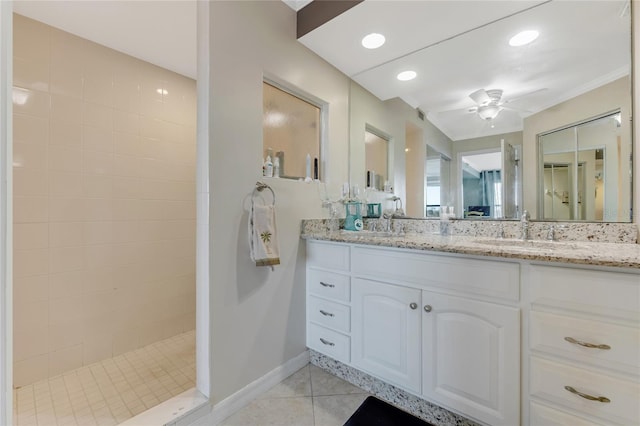 533 Marina Point Dr Unit 533, Daytona Beach, FL 32114 - full bath featuring double vanity, tile patterned flooring, walk in shower, ceiling fan, and a sink