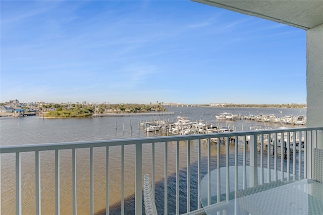 533 Marina Point Dr Unit 533, Daytona Beach, FL 32114 - balcony featuring a water view and a boat dock