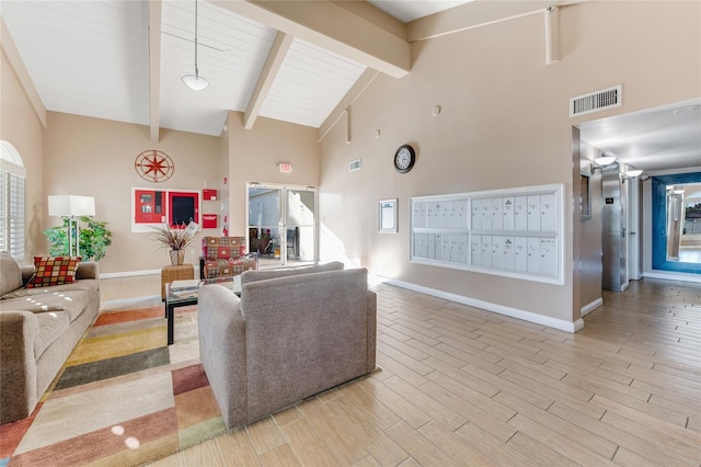 533 Marina Point Dr Unit 533, Daytona Beach, FL 32114 - living area with light wood-style floors, mail area, high vaulted ceiling, visible vents, and baseboards