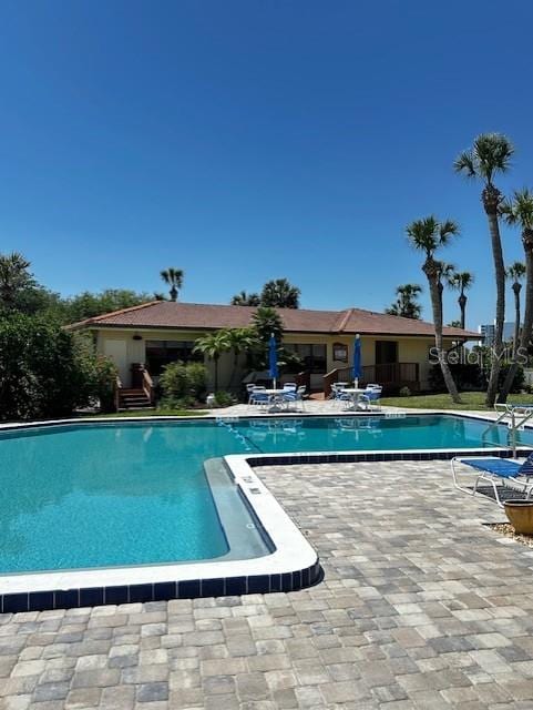 533 Marina Point Dr Unit 533, Daytona Beach, FL 32114 - community pool with a patio area