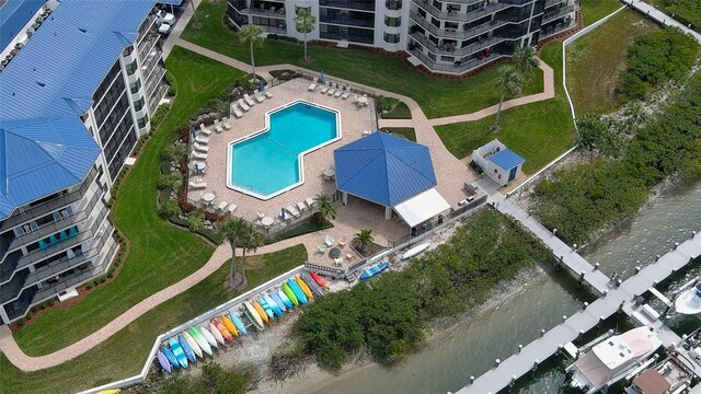 birds eye view of property with a water view