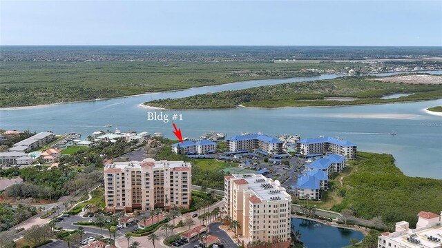 bird's eye view with a water view