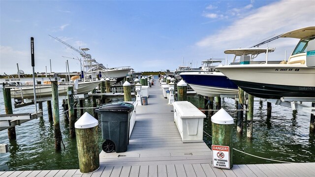view of dock with a water view and boat lift