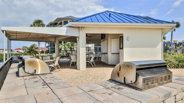 view of patio / terrace with an outdoor kitchen, area for grilling, and outdoor dining space