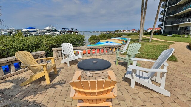 view of patio / terrace with a water view