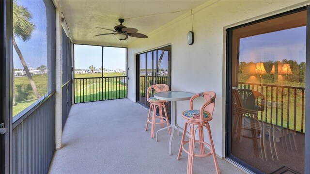 2700 N Peninsula Ave Unit 113, New Smyrna Beach, FL 32169 - sunroom with ceiling fan