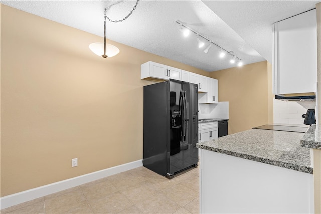 kitchen with baseboards, decorative backsplash, black appliances, a textured ceiling, and white cabinetry