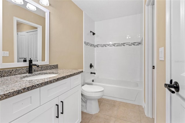 bathroom featuring tile patterned floors, toilet, shower / tub combination, a textured ceiling, and vanity