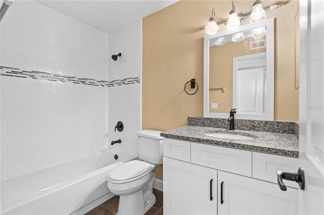 full bath with vanity, washtub / shower combination, visible vents, tile patterned floors, and toilet