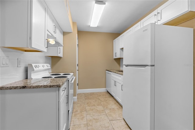 kitchen featuring white appliances, light tile patterned floors, baseboards, white cabinets, and under cabinet range hood