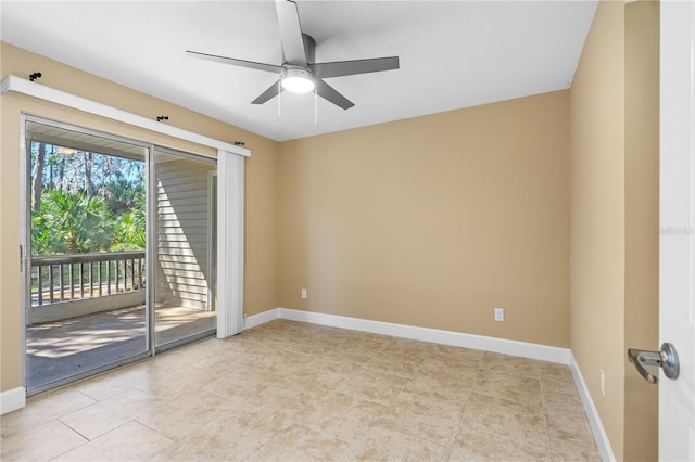 empty room featuring light tile patterned floors, baseboards, and a ceiling fan