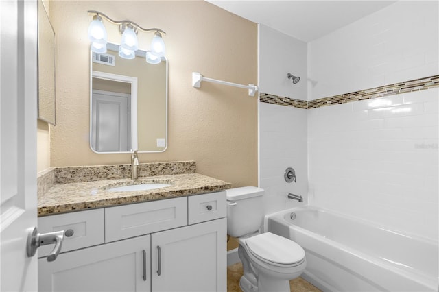 full bath with visible vents, toilet,  shower combination, and vanity