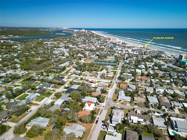 bird's eye view with a residential view and a water view