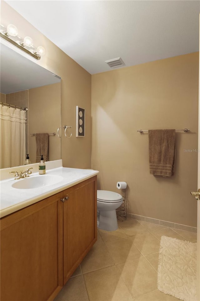 full bath with tile patterned flooring, visible vents, toilet, and vanity