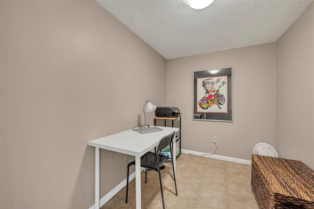 135 Cedar Dunes Dr, New Smyrna Beach, FL 32169 - office with light tile patterned flooring, a textured ceiling, and baseboards