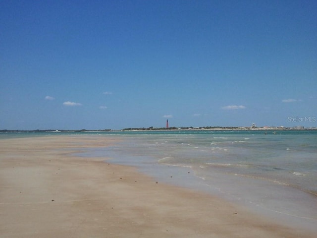 view of water feature with a view of the beach