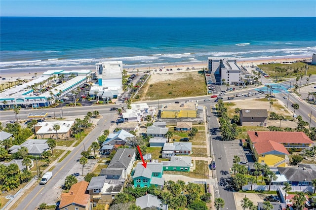 aerial view featuring a water view and a view of the beach