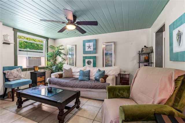 living area featuring light tile patterned floors, cooling unit, wood ceiling, and a ceiling fan