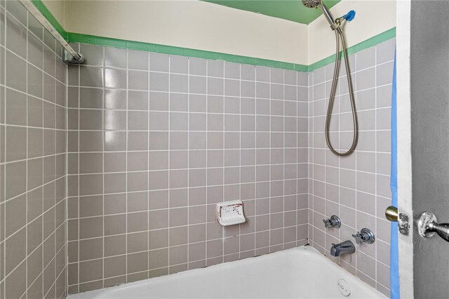 full bathroom with bathtub / shower combination