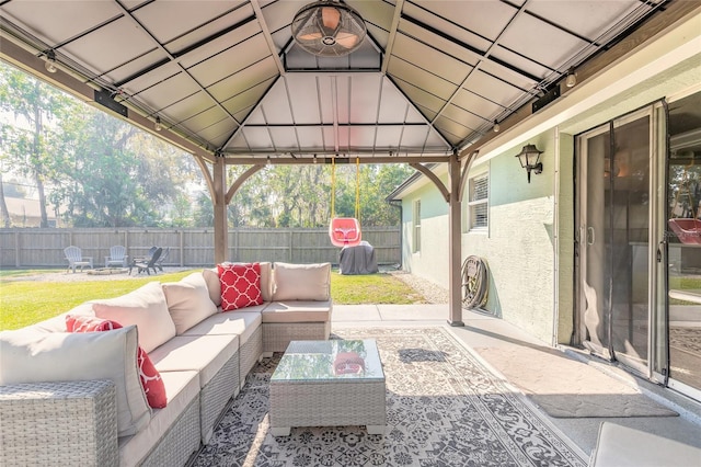 view of patio with a gazebo, outdoor lounge area, and a fenced backyard