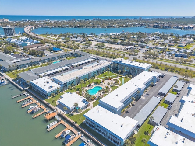 birds eye view of property featuring a water view