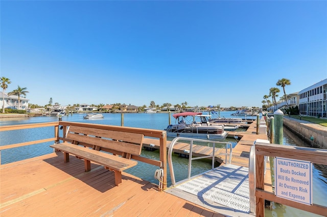 dock area with a water view