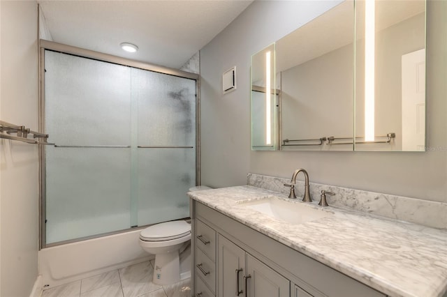 full bath with enclosed tub / shower combo, marble finish floor, toilet, and vanity