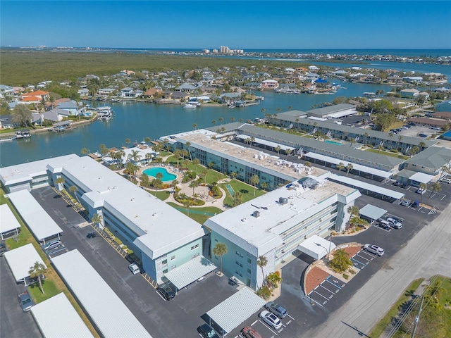 drone / aerial view with a water view